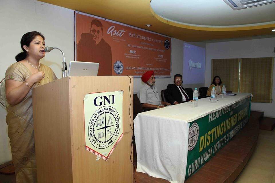 Atifa Deshamukhya speaking at the podium at Guru Nanak Institute of Management & Technology, Ludhiana, at an ISTE Students’ Chapter event.